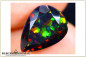 Preview: Tropfenschliff facettierter Welo Opal - smoked - 3,62ct