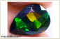 Preview: Tropfenschliff facettierter Welo Opal - smoked - 1,17ct