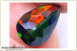 Preview: Tropfenschliff facettierter Welo Opal - smoked - 1,17ct