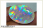 Preview: Riesiger Welo Prism Rainbow Pinfire Opal facettiert im Ovalschliff  - 25,86ct