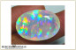 Preview: Riesiger Welo Prism Rainbow Pinfire Opal facettiert im Ovalschliff  - 25,86ct