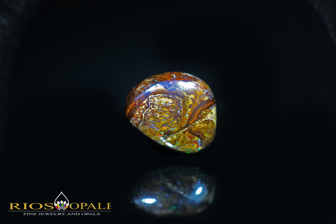 Bunter 27,11ct Koroit Boulder Opal mit roten, blauen und grünen Opaladern