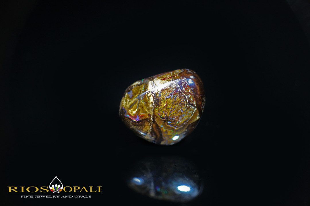 Bunter 27,11ct Koroit Boulder Opal mit roten, blauen und grünen Opaladern